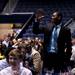 Michigan freshman Glenn Robinson III stands and waves to the crowd after being awarded "best dressed" during the basketball banquet on Tuesday, April 16. AnnArbor.com I Daniel Brenner